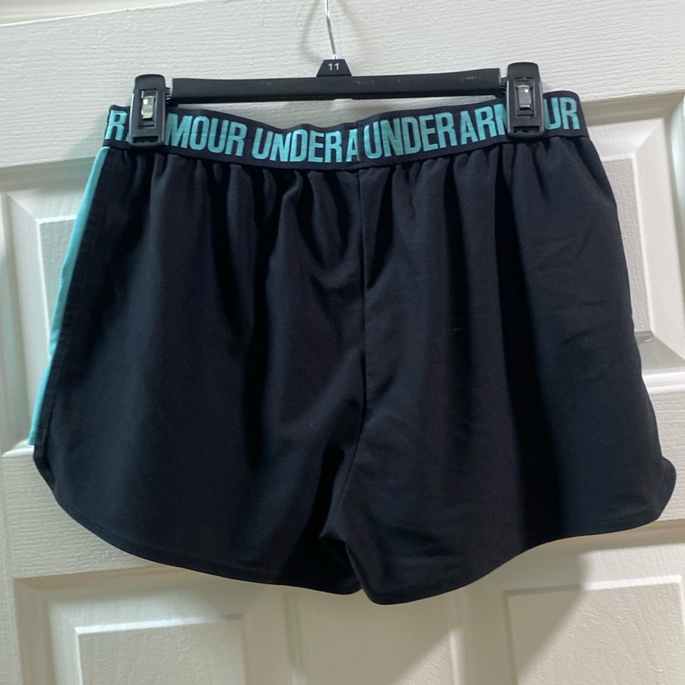 Gently used black & blue athletic shorts from Under-Armour with pockets